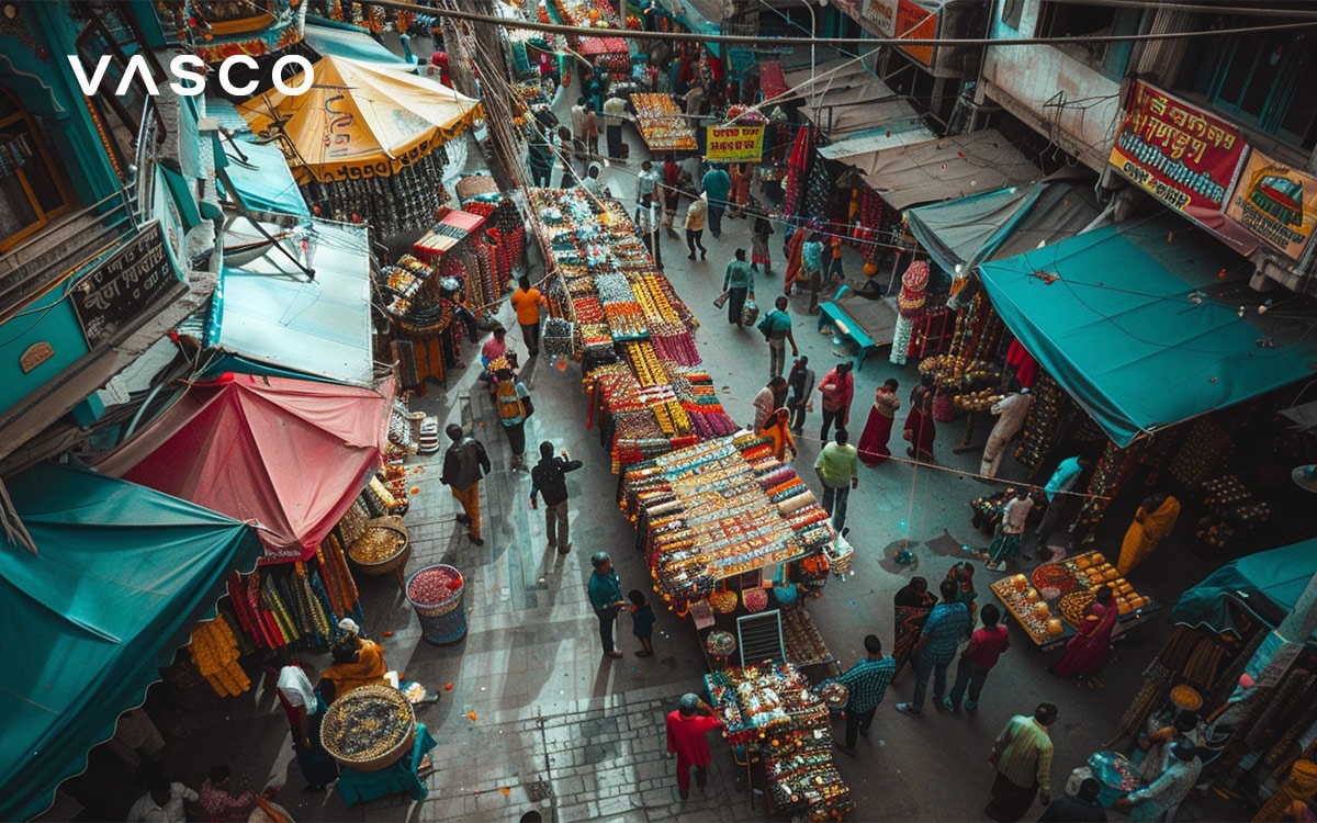 Bustling street market with colorful stalls and people walking through